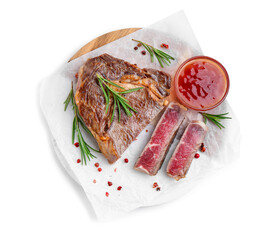 Pieces of delicious beef meat, spices and sauce isolated on white, top view