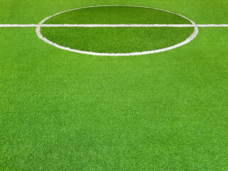 Obraz premium Green artificial grass field texture background concept with white lines, used sports scenes, outdoor and indoor football, soccer, futsal, playground.