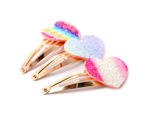 Many cute hair clips isolated on white