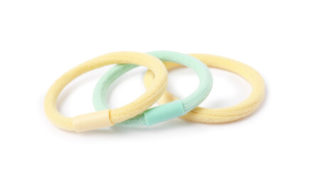 Many colorful hair ties isolated on white