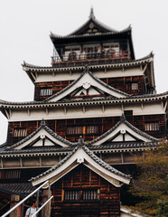 Fototapeta premium Hiroshima Castle, Hiroshima city, Carp Castle, Japan, autumn fall landscape vibrant view and momiji foliage, building, Hiroshima prefecture, travel to Japan