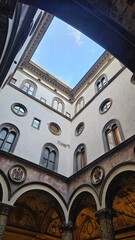 "Florence, Italy – A breathtaking view of the city’s iconic landmarks, including the Duomo and Ponte Vecchio. 