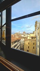 "Florence, Italy – A breathtaking view of the city’s iconic landmarks, including the Duomo and Ponte Vecchio. 
