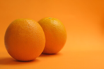 two oranges one after the other