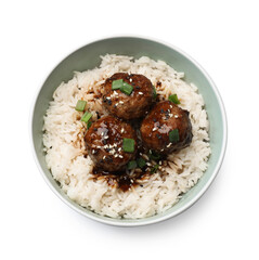Delicious rice with meatballs, sauce and green onions in bowl isolated on white, top view