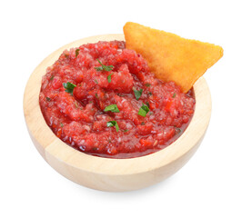 Spicy salsa sauce in bowl and nacho chip isolated on white
