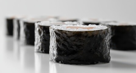 Freshly made sushi rolls arranged on a clean surface showcasing the vibrant appearance of traditional Japanese cuisine with attention to detail and texture.