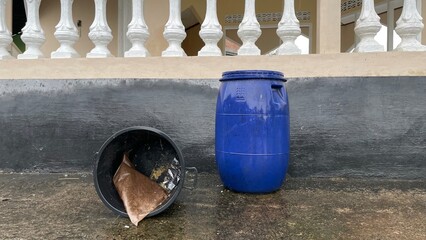 Plastic Barrels and Buckets Outdoors