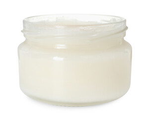 Organic coconut cooking oil in glass jar isolated on white