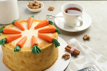 Delicious homemade carrot cake served on light grey table