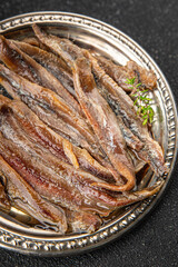 Anchovy fillet fish seafood snack aperitif fresh tasty food dish delicious gourmet food background on the table rustic food top view copy space pescetarian diet