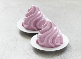 Black grapes Cream dessert in the form of French Chantilly cream. Close up