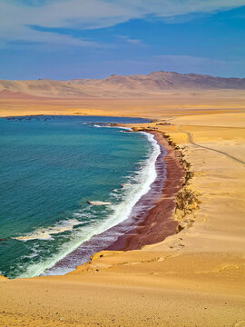 The unique coastline of Paracas National Reserve at Playa Roja, Peru.