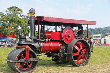 Vintage Steam Traction engine in a field	