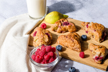 Pear and raspberry scones. Fresh pastries.