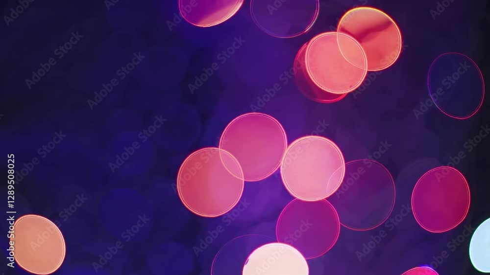 Poster abstract video with a bokeh effect, showcasing colorful circular lights. the camera angle is close-u