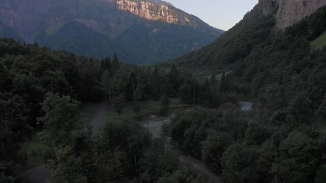 Le Giffre River in Sixt Fer A Cheval Nature Park, Summer Morning Walk in Nature park, french alps, France, 4k drone video