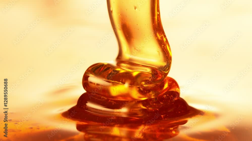 Poster super slow motion of dripping honey creating wavy shape in detail. extreme macro shot, selective foc