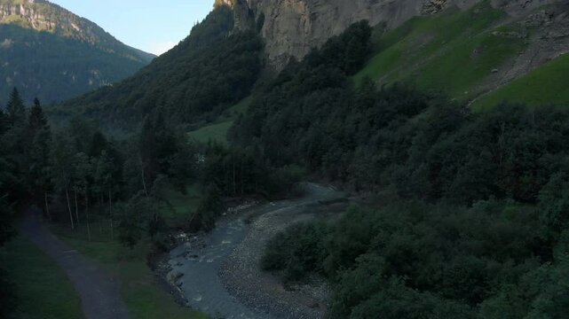 Le Giffre River in Sixt Fer A Cheval Nature Park, Summer Morning Walk in Nature park, french alps, France, 4k drone video