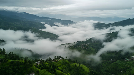 Mountainous regions enveloped in low-lying cloud formations