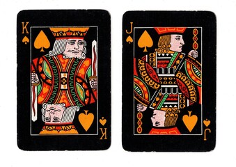 A pair of vintage blackjack or pontoon playing cards on a white background.