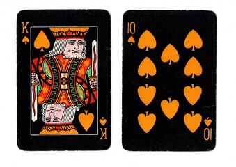 Obraz premium A pair of vintage blackjack or pontoon playing cards on a white background.