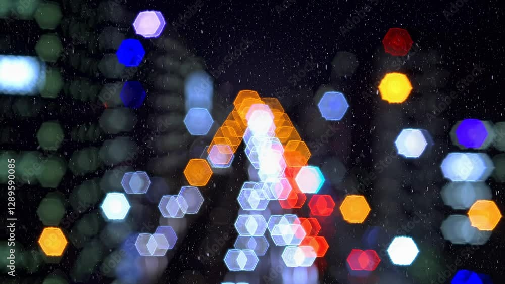 Poster abstract cityscape with colorful bokeh lights and raindrops, captured from a low angle, creating a d