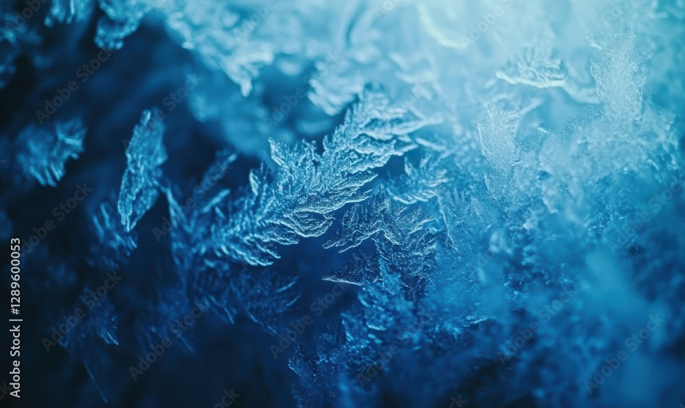 Poster artistic close-up of frosty window patterns illuminated by soft blue light, capturing intricate icy 