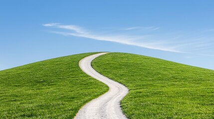 Obraz premium Winding road up grassy hill, clear sky; travel, journey concept