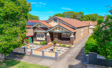 Drone Aerial View of an inner western Sydney Suburban residential Brick house in Sydney  NSW Australia