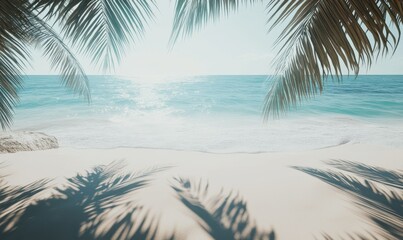 Peaceful beach scene with soft white sand, turquoise water, and palm trees casting long shadows under bright sunlight.