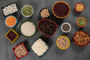 several pots with raw grains for preparing healthy food
