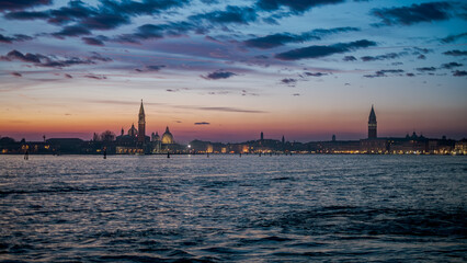 Fototapeta premium Beautiful autumnal dusk on venetian lagoon and San Marco square, Venice, Italy