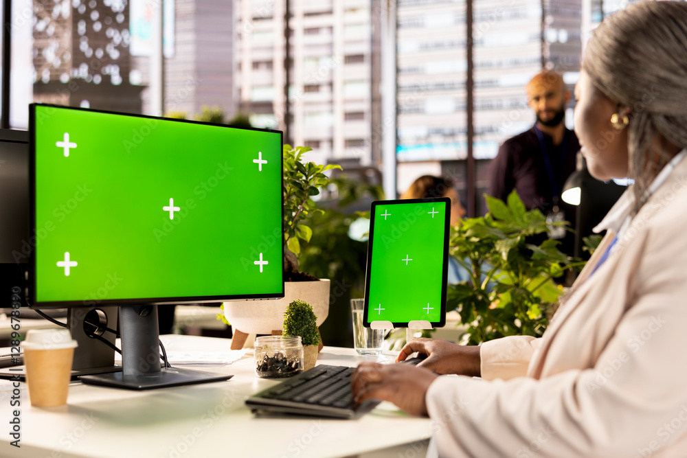 Poster female employee completing business operations and tasks next to chroma key, networking to guarantee