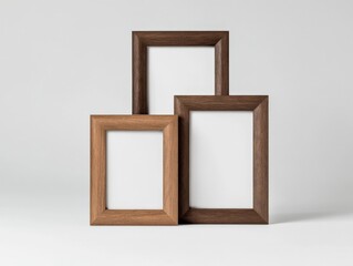 Three Brown Picture Frames on a White Background