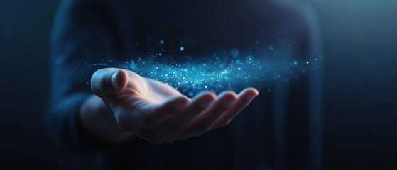 Hand holding Glowing particles in the Dark