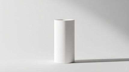 Minimalist white cylinder on white background