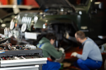Workshop for car repair with table with different tools