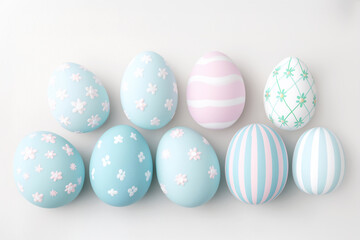 Fototapeta premium Easter Background with pastel hand painted Eggs, with a soft and warm feel
