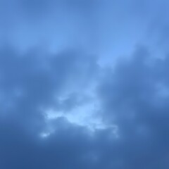 Fototapeta premium Misty Evening Sky with Shades of Blue and Gray, Post Sunset