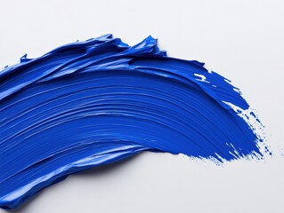 close up of blue paint stroke on white background