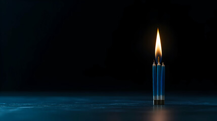 Fototapeta premium Single Blue Candle Flame in Dark Setting