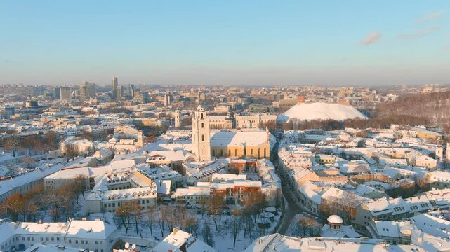 Beautiful sunny Vilnius city scene in winter. Aerial early evening view. Winter city scenery in Vilnius, Lithuania.