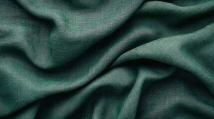 Fototapeta premium Elegant Emerald Fabric: This image captures the exquisite texture and rich color of a folded emerald green fabric, showcasing its subtle details and elegant drape.