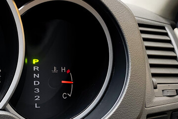 Naklejka premium speedometer and car automatic transmission indicator light showing “P” position , parking position 