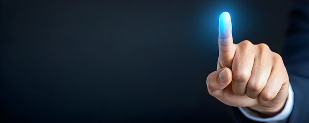 A hand pointing to a button on a screen