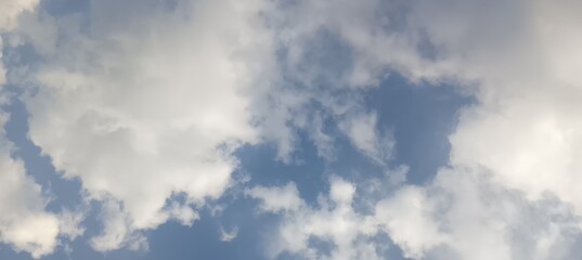 View of blue sky with light clouds