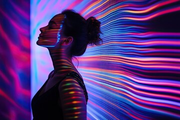 Woman experiencing interactive light installation art in immersive digital environment