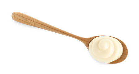 Tasty mayonnaise sauce in wooden spoon isolated on white, top view
