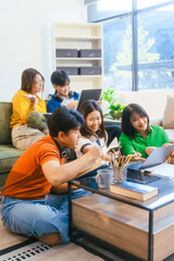 Five young Asian students engage in online study on campus, collaborating on research, projects. They help each other with assignments, gaining valuable experience and preparing for future careers.